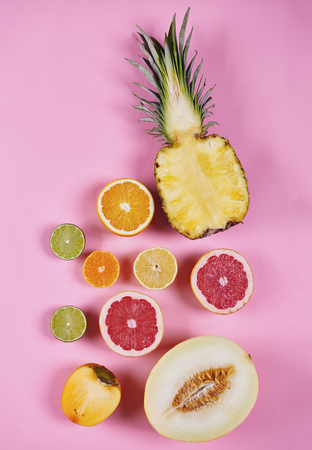 Various halved exotic fruits at studio shot 