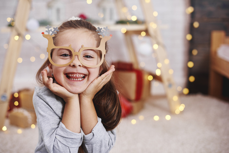 Portrait of adorable girl with funny glassesの写真素材