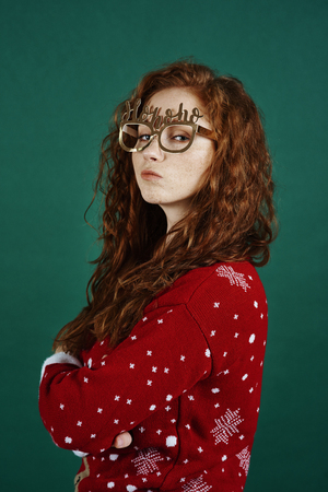 Portrait of disappointment and sad girl at Christmasの写真素材