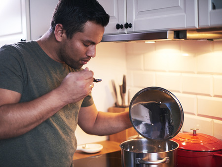 Man enjoying the aroma of a mealの写真素材