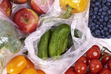  Plastic bags of fruits and vegetablesの写真素材