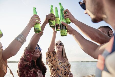 Friends start a party on fresh airの写真素材