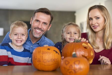 Portrait of smiling family in Halloween timeの写真素材