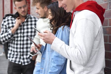 Group of young people using smart phone