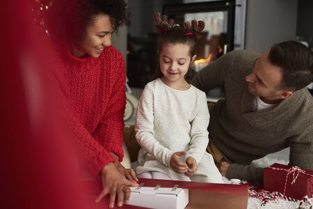 Family packing gifts for Christmasの写真素材