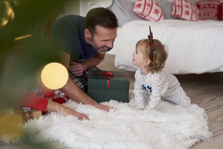 Family with baby in Christmas time