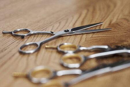 Close up of professional scissors in hair salon の写真素材