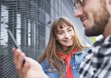Portrait of young woman in the cityの写真素材