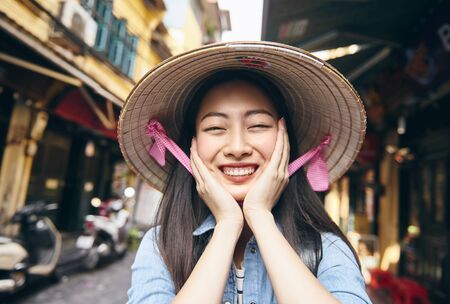 Portrait of beautiful Vietnamese woman in Hanoi cityの写真素材
