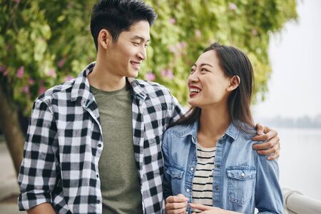 Couple in love standing face to faceの写真素材