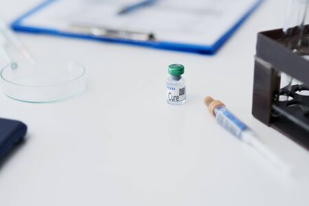 Ampule of medical cure on the deskの写真素材