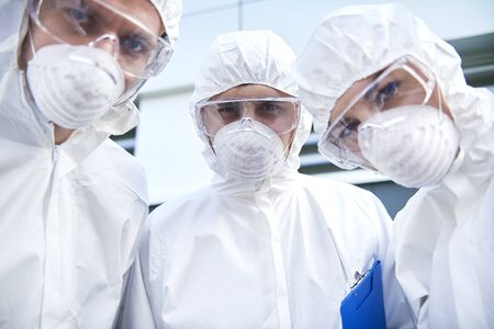 Group of technicians looking at the camera