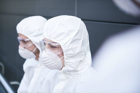 Close up of two technicians at workの写真素材