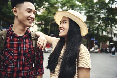 Picture of young couple face to faceの写真素材