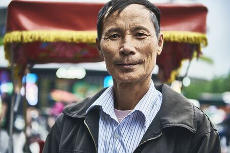 Horizontal portrait of Vietnamese mature manの写真素材