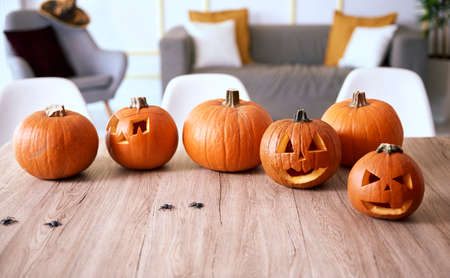 Halloween pumpkins on wooden tableの写真素材