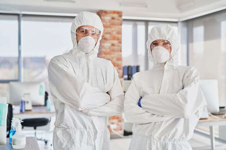 Portrait of two technicians in protective workwear in the officeの写真素材