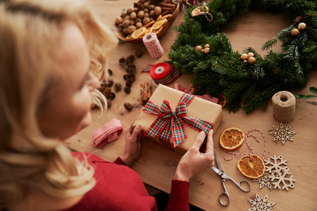 Top view of woman with Christmas gift readyの写真素材
