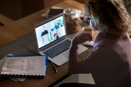 Top view of video conference to late at homeの写真素材