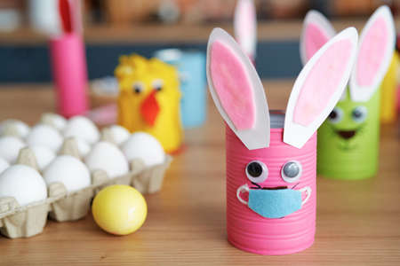 Close up of handmade Easter rabbit in protective mask