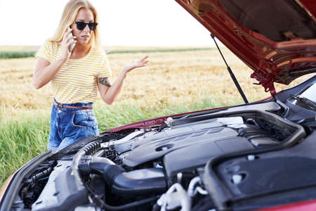 Woman calling for help on the road