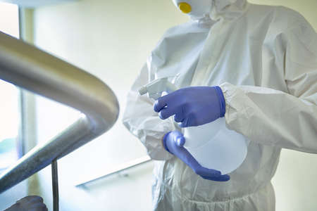 Close up of disinfection with a spray bottleの写真素材