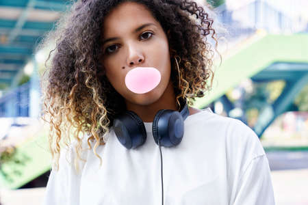 Close up portrait of African woman with chewing gumの写真素材