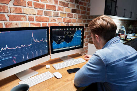 Man following stock market data