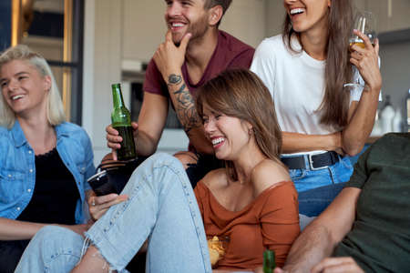 Friends having fun on home party