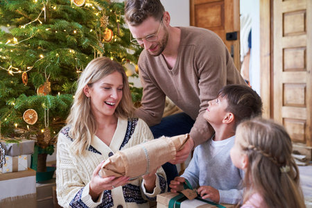 Family sharing the Christmas presents