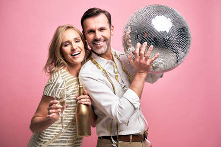 Adult couple at the partyの写真素材