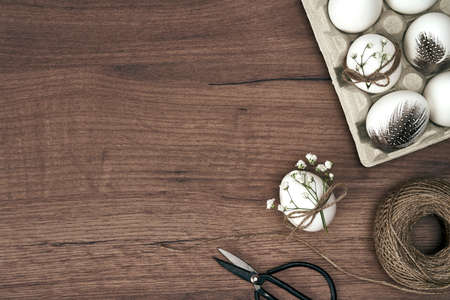 Directly above shot of eggs in tray on the wooden desks