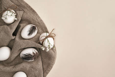 Directly above shot of easter eggs on the natural textile