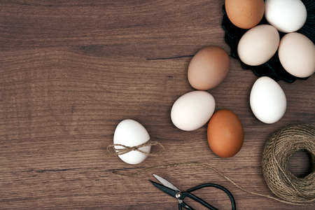 Directly above shot of natural eggs on the wooden desksの写真素材
