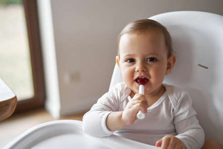 Little baby girl taking medicine