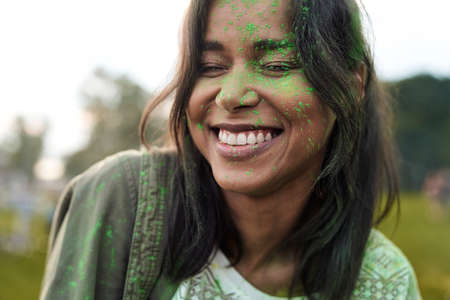 Portrait of multiracial woman at Holi Festivalの写真素材