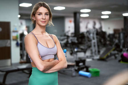 Portrait of caucasian woman at the gymの写真素材