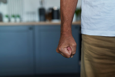 Close up of caucasian aggressive man's fistの写真素材