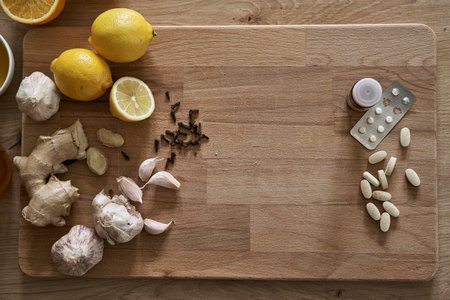 From above desk with natural medicines and pills for illnessの写真素材