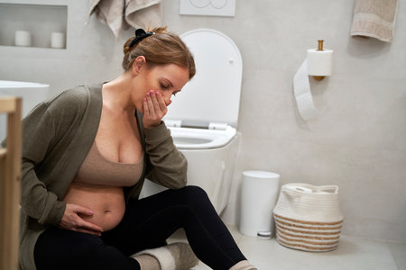 Pregnant woman having morning sicknessの写真素材