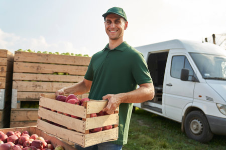 Portrait of sales representative on apple orchardの写真素材