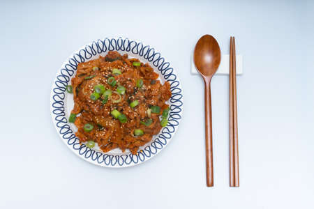 tir-fried Spicy Pork Chops on a Plateの写真素材
