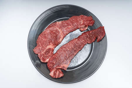 Beef fillets neatly served in a bowlの写真素材