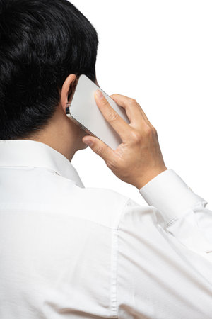 An Asian adult male using a smart deviceの写真素材