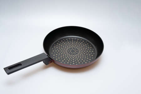 Cooking frying pan concept over white backgroundの写真素材