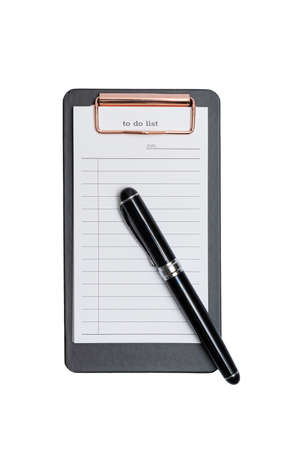 To-do list and fountain pen on a white backgroundの写真素材