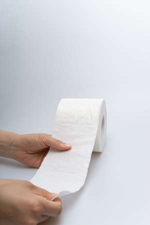 Cleanliness and hygiene toilet paper concept on white backgroundの写真素材