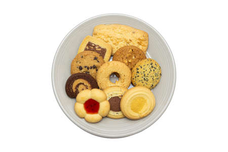 Different types of sweet cookies in bowlsの写真素材