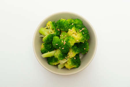 Broccoli-cooked dish neatly served in a bowlの写真素材