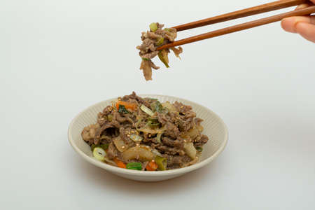 Delicious looking bulgogi dish served in a bowlの写真素材